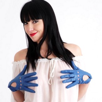 Woman In Leather Gloves